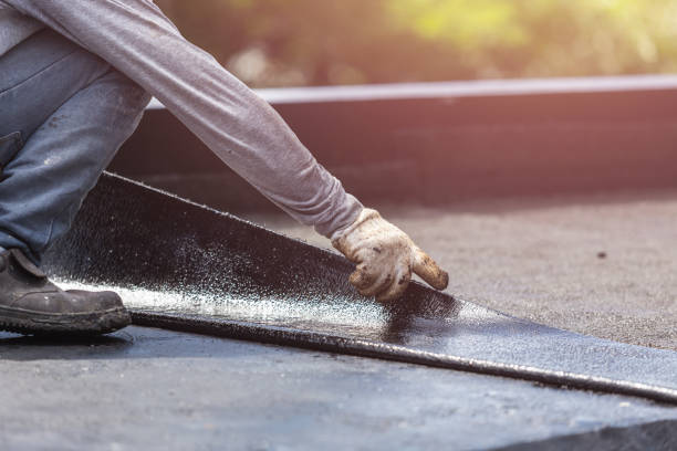 Professional Basement Waterproofing technician working in Glouster, OH